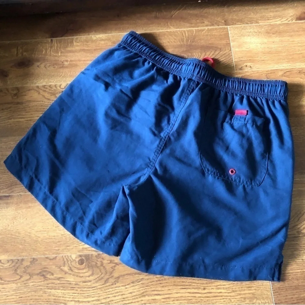 George blue swim trunks in size M (32-34)